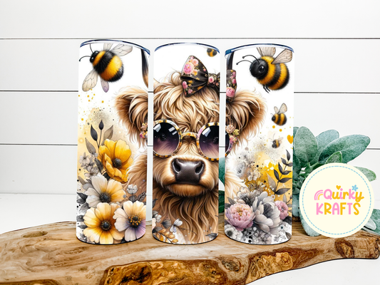 Highland cow and bees